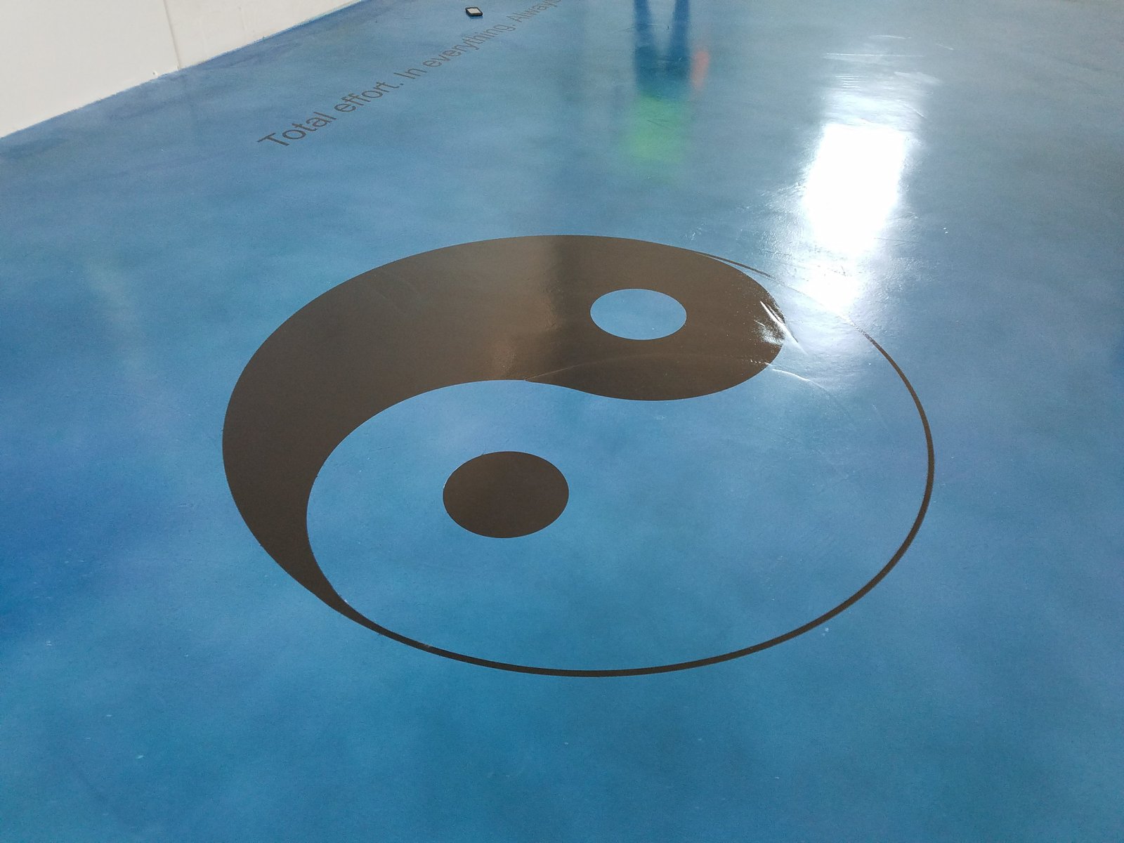 Yin-yang blue epoxy floor